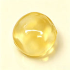 Coconut oil squishy ball by Squishyland, a soft sensory fidget toy designed for stress relief and tactile squeezing.