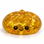 Squishyland jumbo glitter sugar dumpling squishy, 8.5cm, slow rising maltose sensory fidget toy with sparkling sugar appearance.
