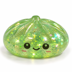 Bright glitter Maltose Sugar Dumpling squishy toy by Squishyland, 8.5cm, with slow rising texture and sparkling decorative details.