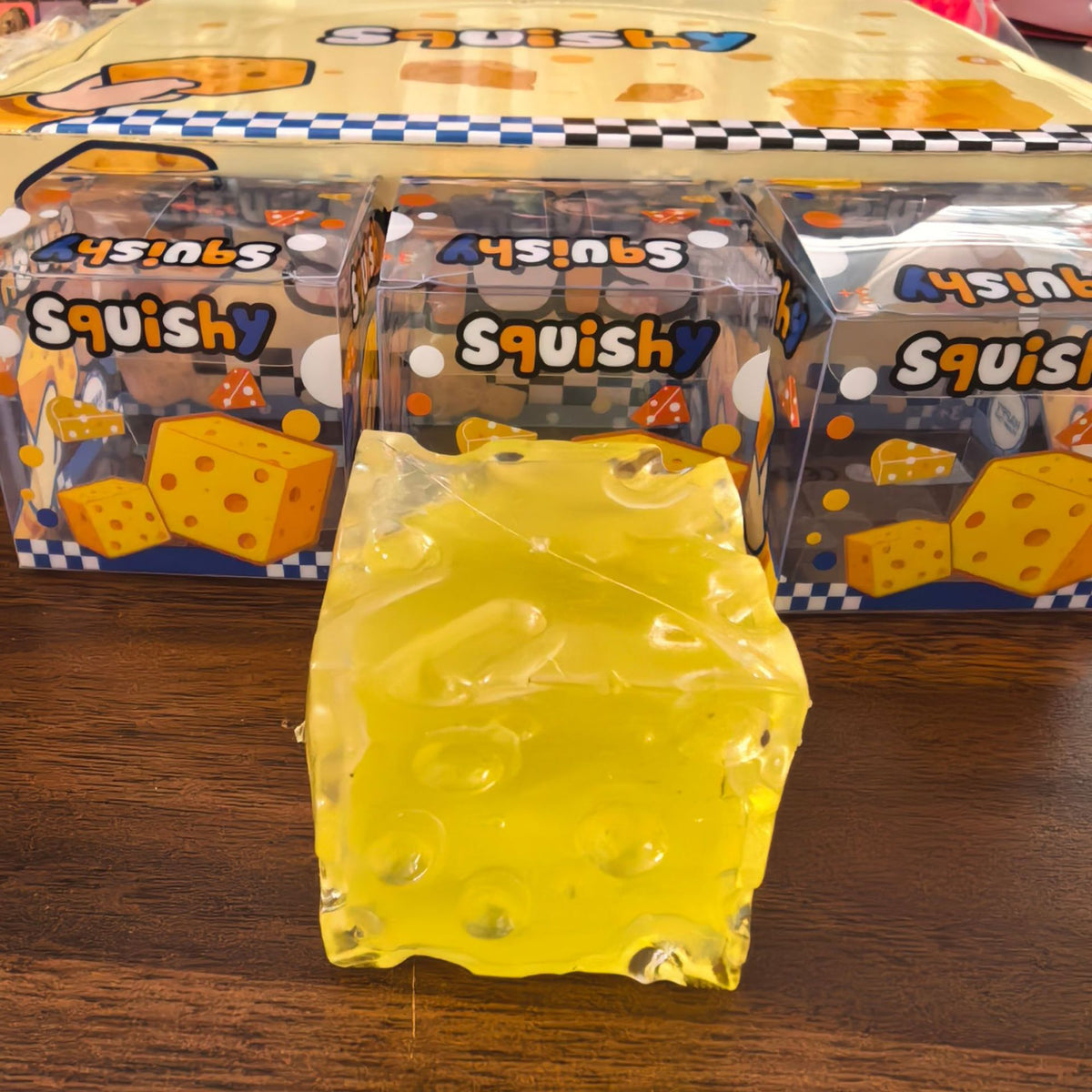 Vaseline Cheese squishy toy from Squishyland, a moldable fidget stress ball designed for sensory play and stress relief.