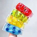 Set of four Squishyland fruit-shaped stress relief toys, slow rebound squishy fidget balls for stress relief and tactile fun.