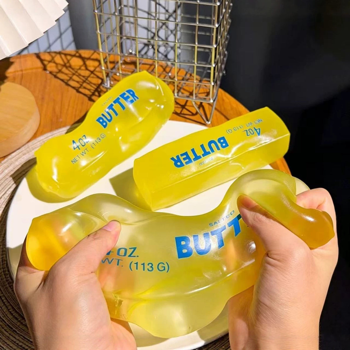 Squishyland Vaseline Butter Stick squishy toy with moldable, no-rebound texture for stress relief and sensory play.